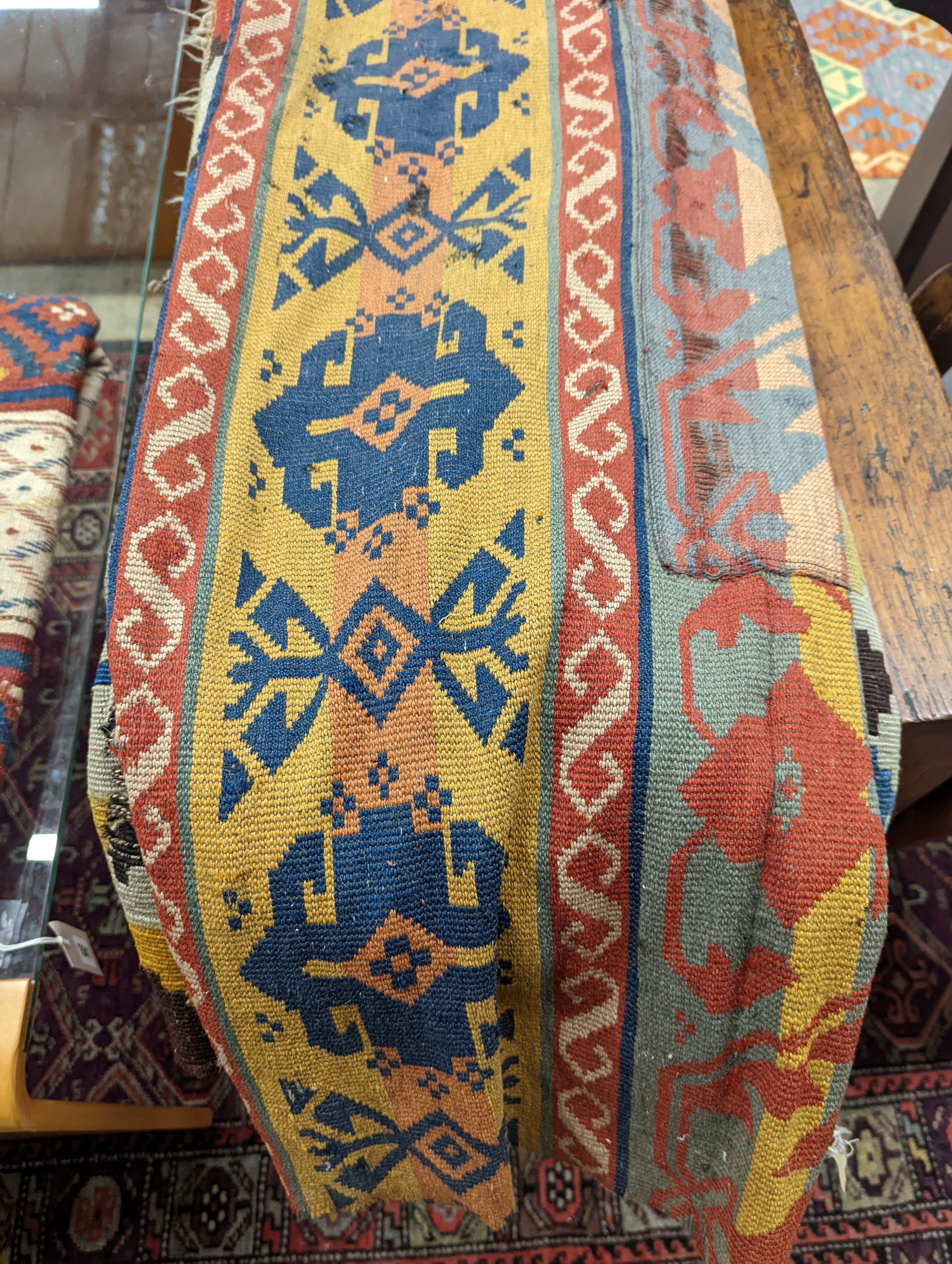 Two antique Kilim hall carpets, both with striped geometric decoration 270 x 128cm and 272 x 158cm both with some holes, 272 x 158cm